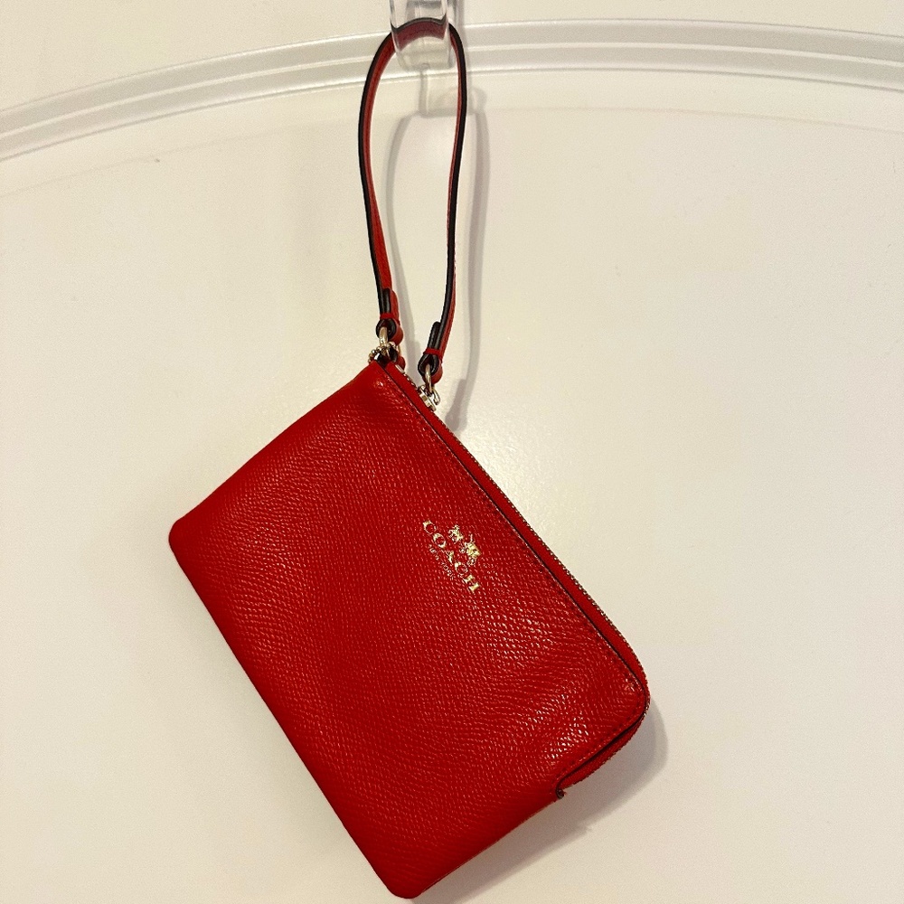 Orangey-Red leather Coach wristlet